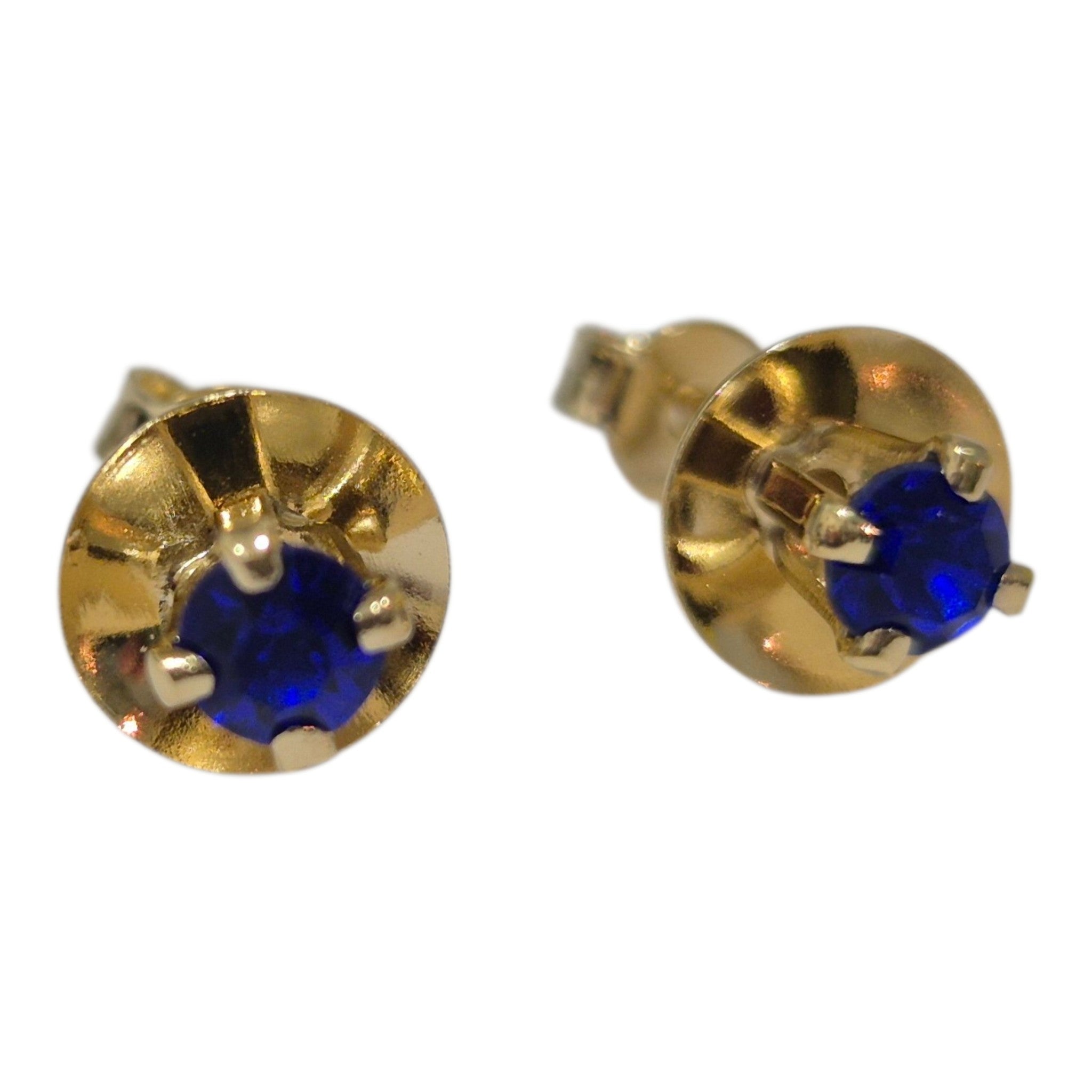 Aros botón de circon azul.