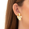 Aros media flor, con ondas y circon central