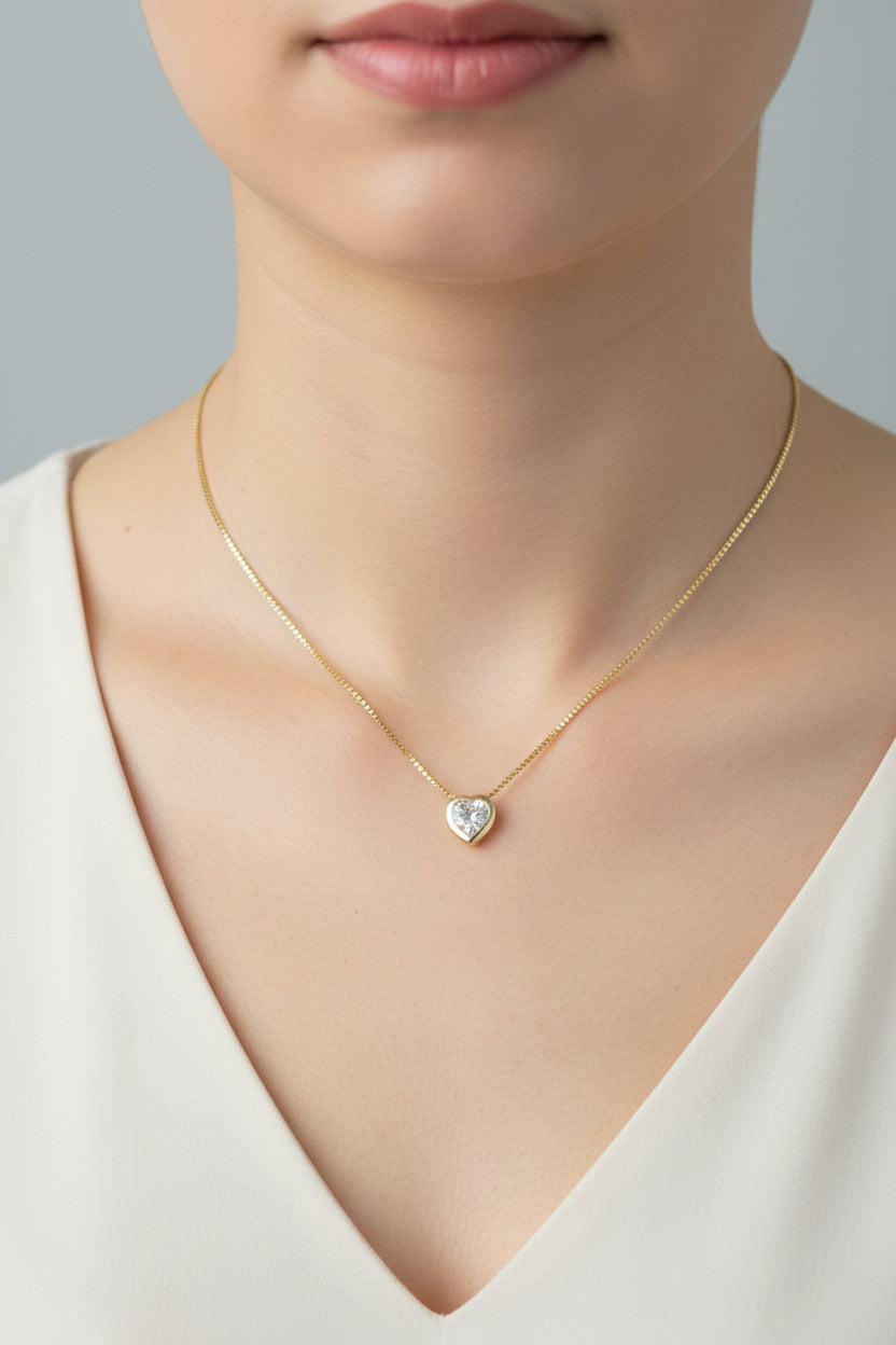 Collar con punto de luz corazón