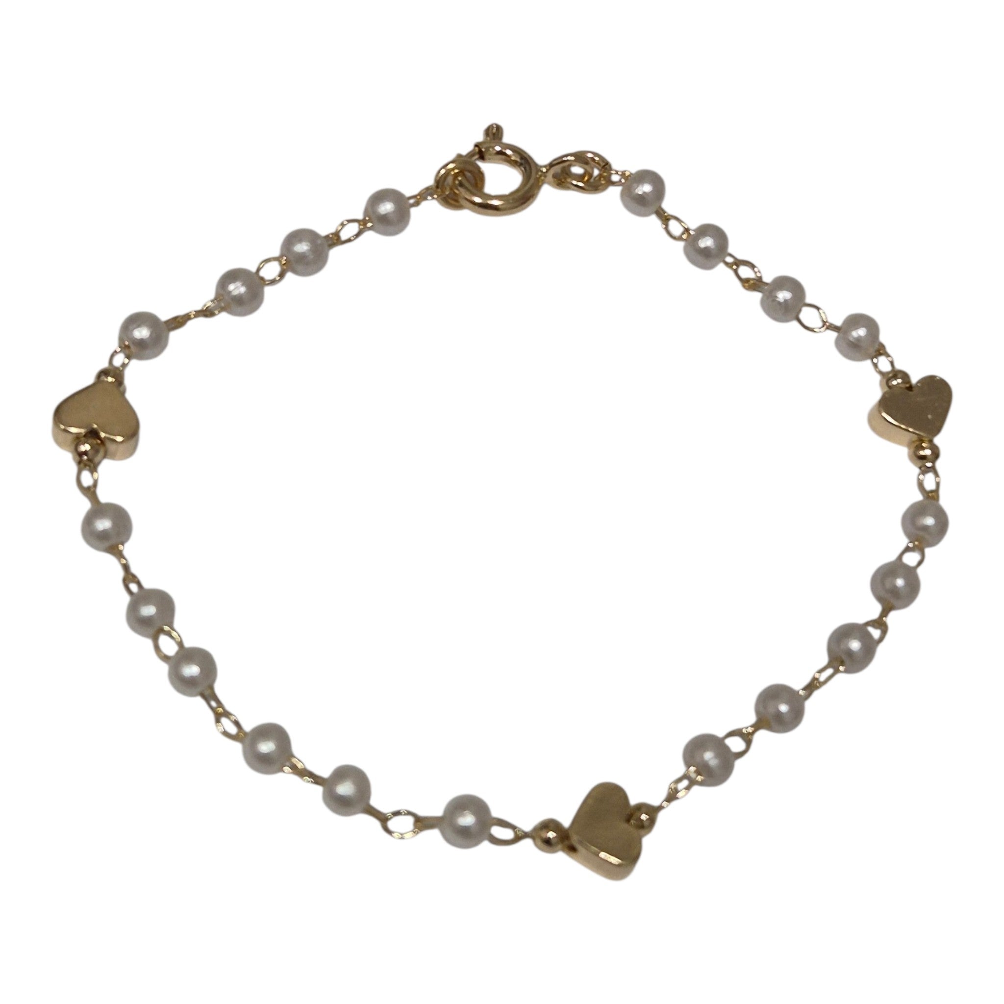 Pulsera infantil,  perlas y corazónes.