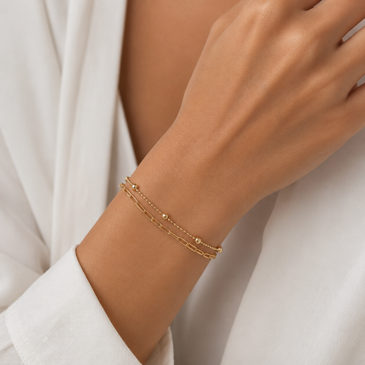 Pulsera doble,  esfera y eslabones.